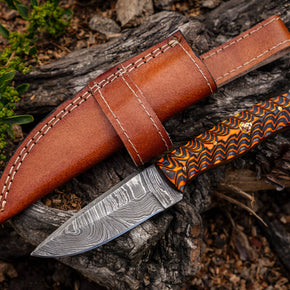 8' Damascus knife with leather sheath  Grooved handle