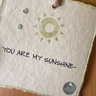 Sterling sun earring with rhinestone