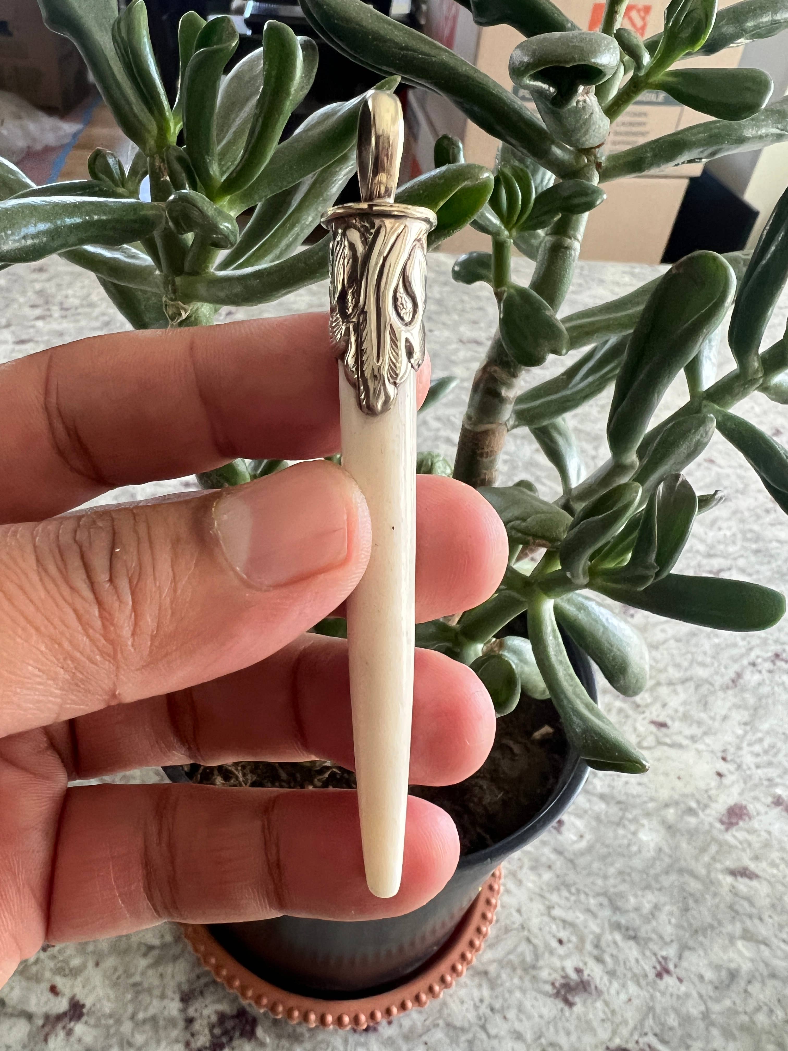 Hand craved bone with turquoise pendant, Tibetan Silver