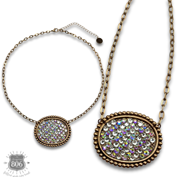 Rhinestone filled oval necklace