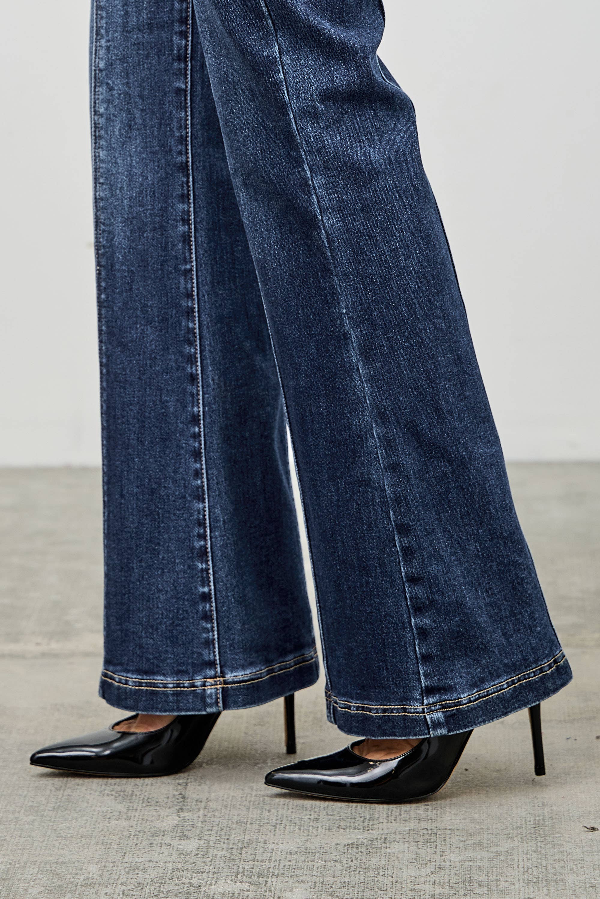 High-Rise Boot Cut Jeans Seam Detail