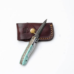 Turquoise Damascus Folding Knife – Hand Engraved Bolster Edition