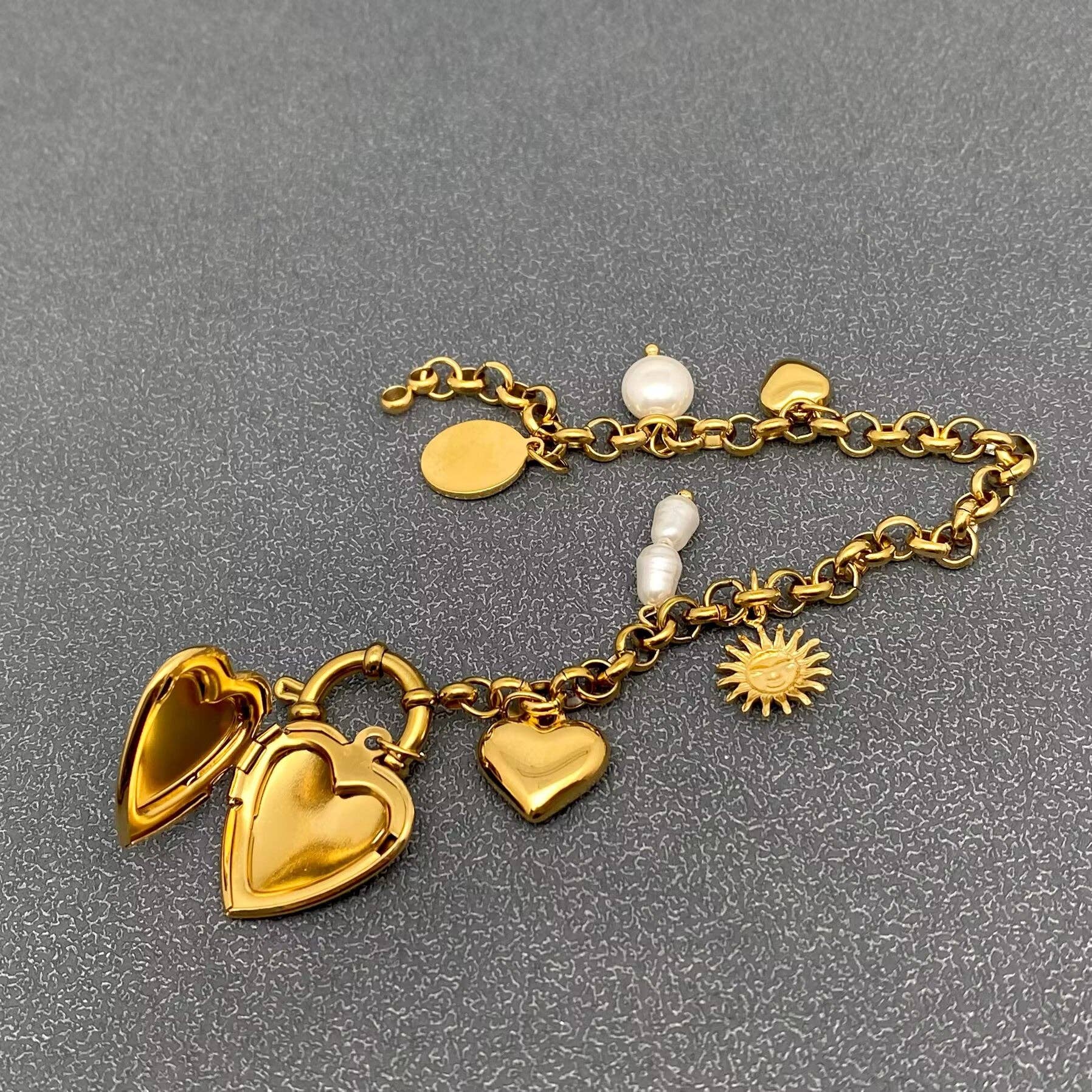 18 GP S.Steel Heart Locket Charm Bracelet