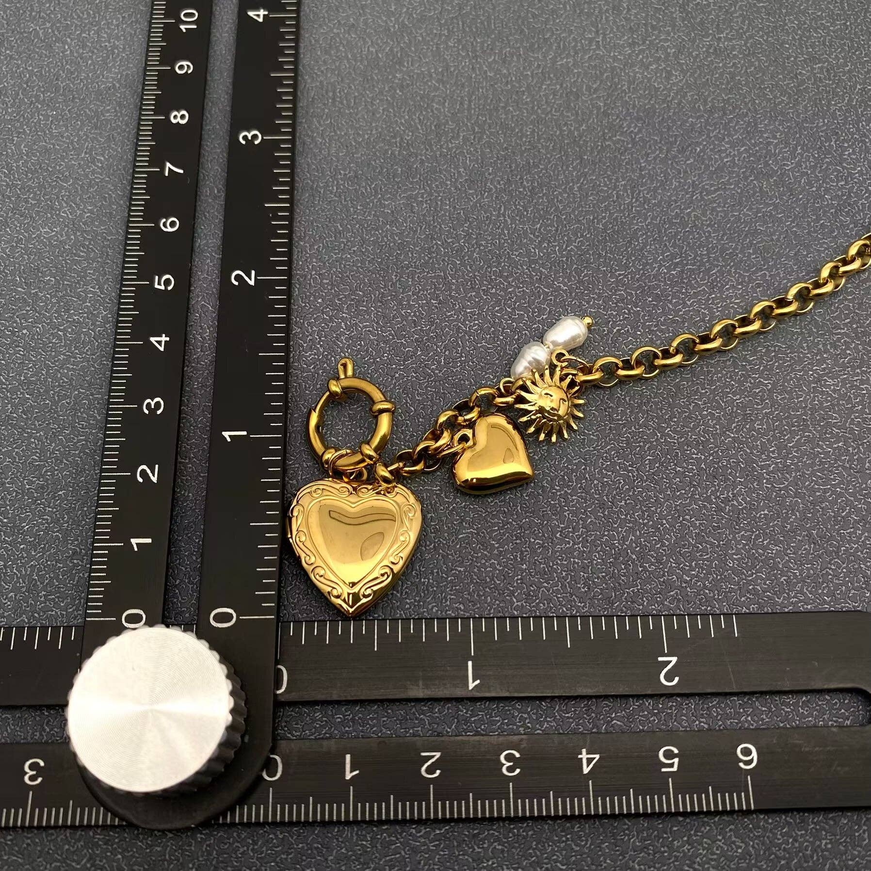 18 GP S.Steel Heart Locket Charm Bracelet