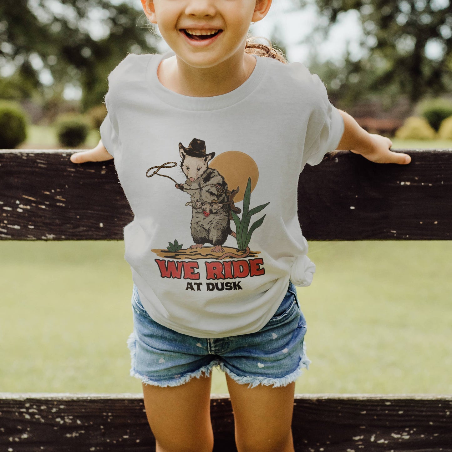 Possum Cowboy, We Ride at Dusk Unisex Kid's Shirt