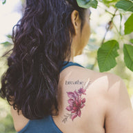 Tiny Intentions Breathe Lotus Tattoo